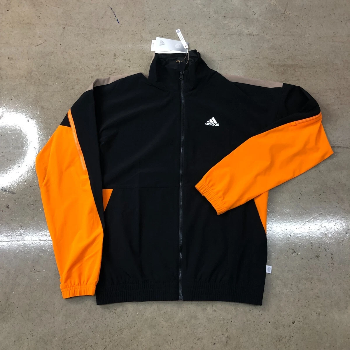 Black and orange adidas jacket top