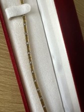 18 carat gold Hand Set diamond Tennis bracelet.