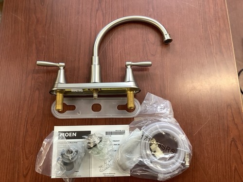 NUEVO Grifo de 2 manijas de acero inoxidable Moen 87048SRS Hutchinson con pulverizador lateral B173 - Imagen 1 de 4