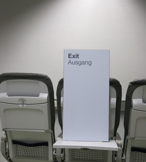 Airport information sign "Exit/Exit"