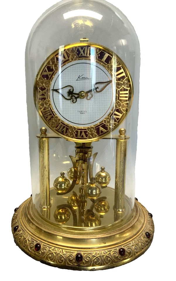 Jolie PENDULE 400 jours KERN pour LANCEL fonctionne clé globe verre - Photo 1/4