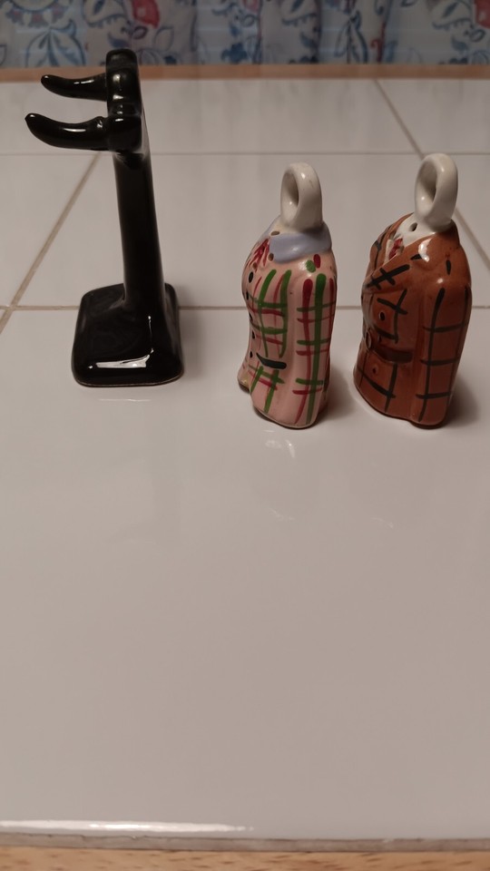 Woman's and Man's Jackets on Black Coat Rack Salt and Pepper Shaker Set
