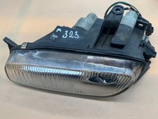 Mazda 323F Frontscheinwerfer Links 11061708  S589