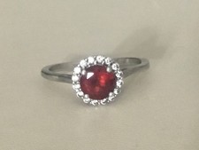 925 sterling silver ring garnet center stone and sparkling white accent stones