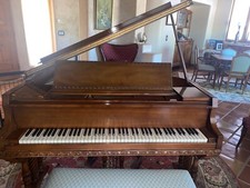Antique Wurlitzer Baby Grand piano