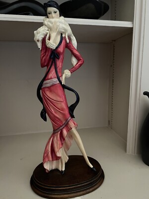 A. Santini Sculpture. Woman.