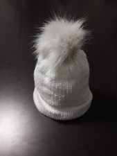 Winter beanie with faux fur pompom. White, but other colors available.