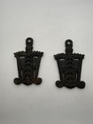2 vintage cast iron trivet features a rustic "Brooms, Grain, and Tassel" — photo 1