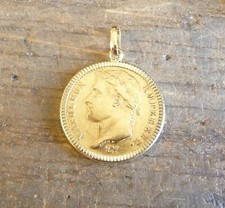 Pendentif porte-pièce ciselé