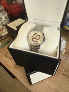Montre Gucci G Timeless YA1264076 38 mm en acier inoxydable argenté coût portée O