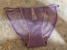 VINTAGE VICTORIA  S SECRET SHEER STRING BIKINI PANTY.  LILAC . S/P NEW 