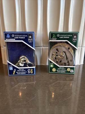 SET OF 2 Hanayama Cast Puzzles Model: ''L'OEUFS'' Level: 4 & ''SEAHORSE'' Level 3