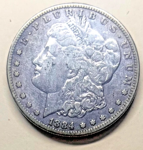 1884 S Morgan she's been around the block but what history, no reserve free ship