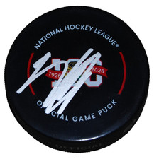 CONNOR BEDARD signed (CHICAGO BLACKHAWKS) Centennial Game puck BECKETT AE61927