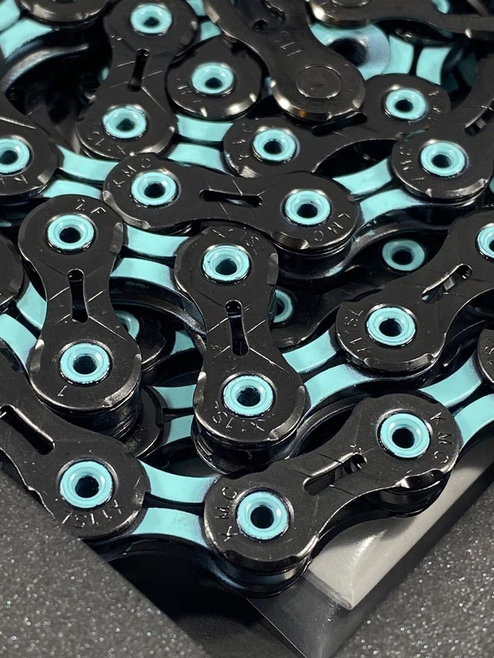 Nueva cadena KMC DLC 11 velocidades 118L negra/verde celeste 11sp Bianchi Foto 2 de 4