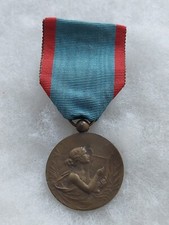 Une médaille  "  Fédération des Sociétés Musicale de L'Aisne ".