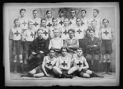 Photo:1920s Men�s Track Team Group Portrait Athletes Cross Jerseys