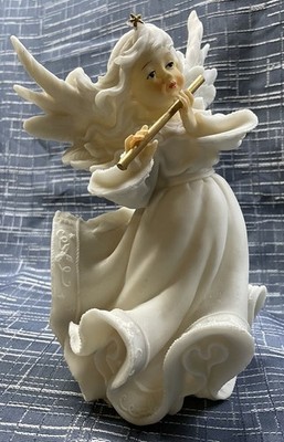 Beautiful Plastic Made Angel Playing The Flute W/Christmas Scroll Around Bottom