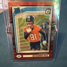 2024 Panini Donruss Optic RATED ROOKIE Red Pandora Prizm #395 Devaughn Vele (RC)