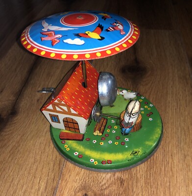 VTG Yone Mechanical Wind Up Happy Grandpa with Ringing Mill Tin