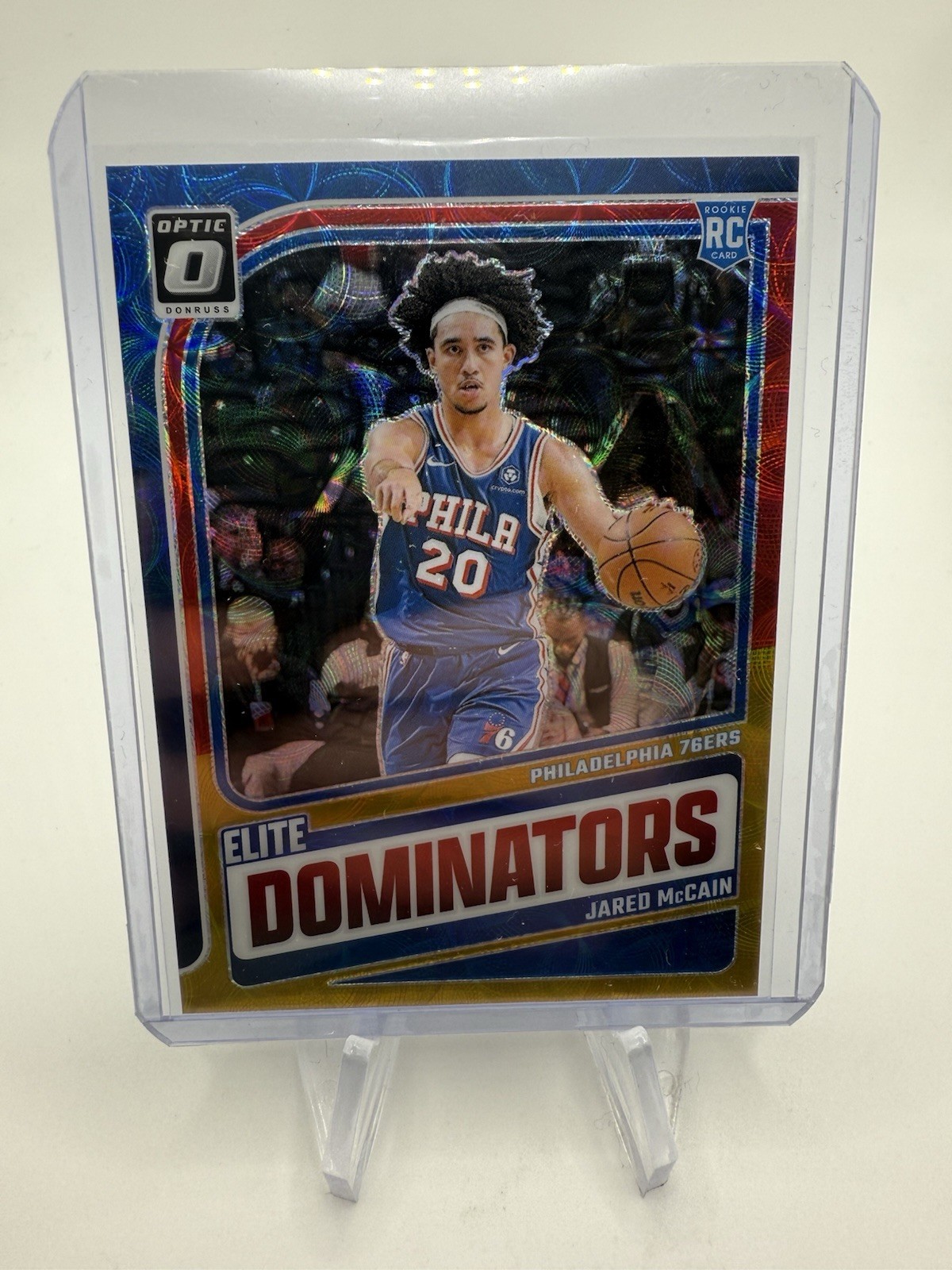 2024-25 Panini Donruss Optic Jared McCain Elite Dominators Red & Gold /99 #17 RC