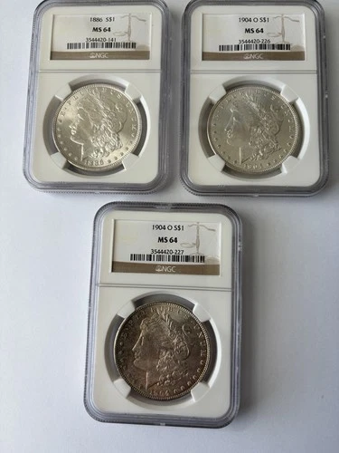 1886, 2) 1904 O Morgan Silver Dollars NGC MS64