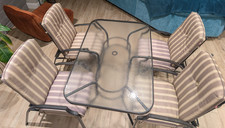 garden dining table and reclining chairs set - covers included