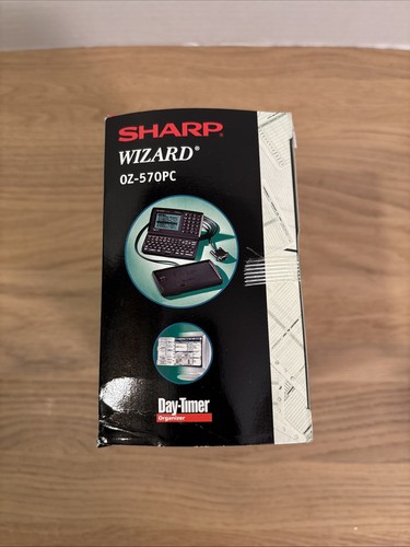 Sharp Wizard 0Z-570PC Day-Timer organiser pda ordinateur rétro "NEUF" boîte ouverte - Photo 4 sur 6