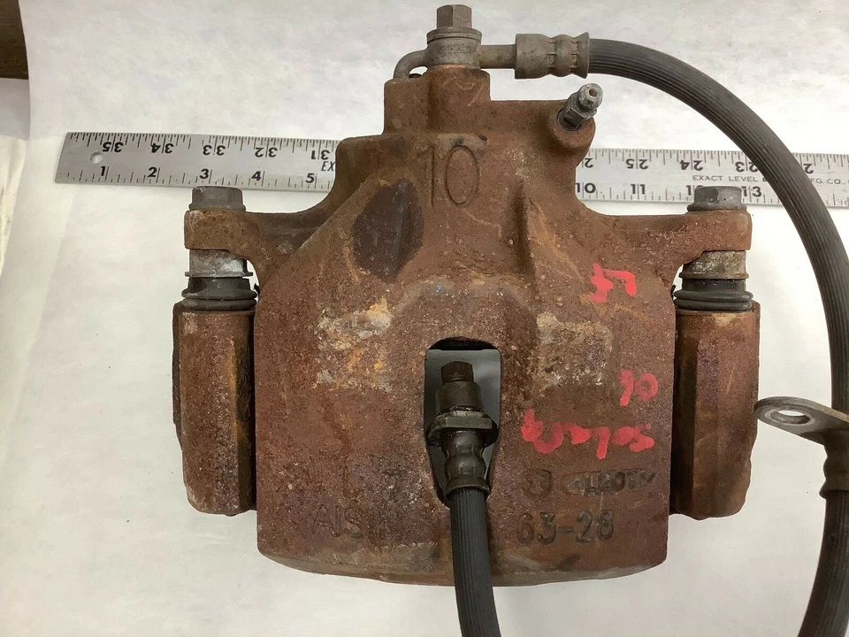 Toyota Solara XV30 2004 2008 pinza de freno delantera izquierda lado del conductor soporte OEM+ Foto 2 de 4