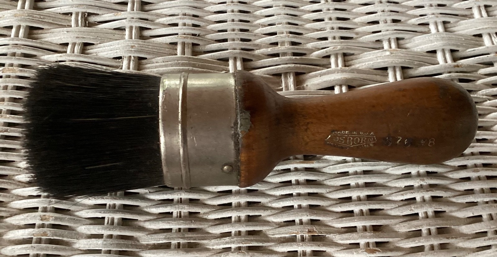 Vintage Osborn #8 brush with black bristles, worn white handle, and metal barrel marked “Made in U.S.A.”