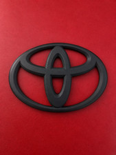 Toyota Tacoma Complete Front Grille Emblem Badge - Matte Black - Fits 2011-2016 Toyota Tacoma Complete Front Grille Emblem Badge - Matte Black - Fits 2011-2016