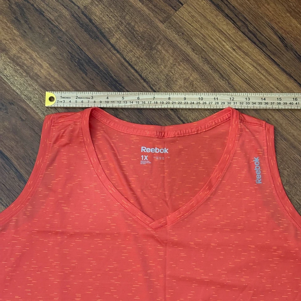 Camiseta sin mangas Reebok para mujer 1X naranja jaspeado rendimiento cuello en V entrenamiento Foto 4 de 4