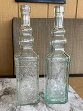 2 OF CLEAR DECORATIVE GLASS BOTTLES 11.5" HIGH