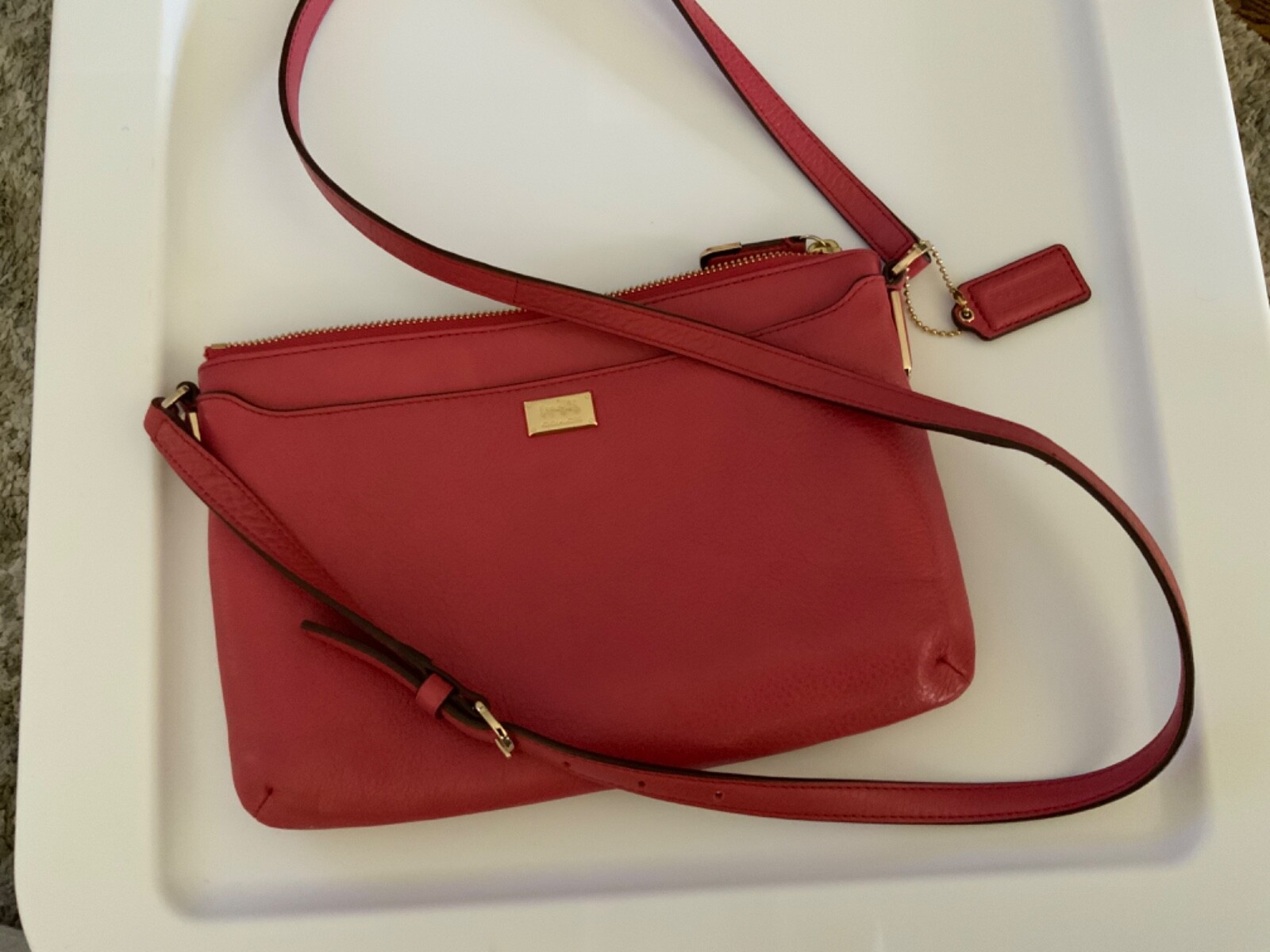 Coach pink crossbody bag pre-owned with zippered main front and inside pockets-image