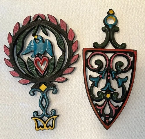 2 Vintage Griswold Sad Iron Trivets No. 3-1725 Flowers & 1730 Bird Heart Painted - product listing photo