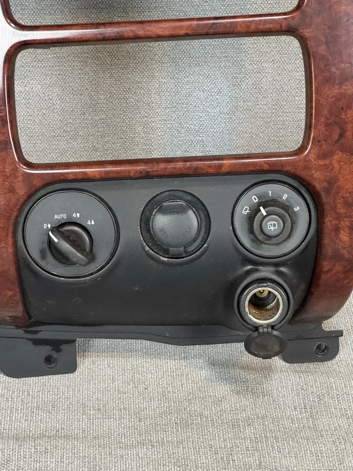 GMC Envoy 2002-2009 tablero central radio bisel ventilación aire moldura madera grano fabricante de equipos originales Foto 2 de 4