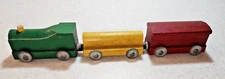 Vintage 3 piece Colorful Wooden Train with Metal Wheels 3" per car 9" long.