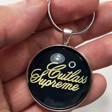 Vintage GM Olds Oldsmobile Gold Cutlass Supreme Emblem Badge Logo Keychain