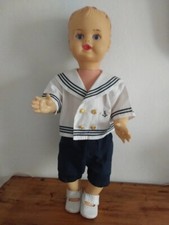 Poupon baigneur ancien en plastique yeux fixes TBE habillé