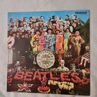 Beatles. Sgt. Peppers Lonely Hearts Club Band. Japanese  press. on red vinyl.