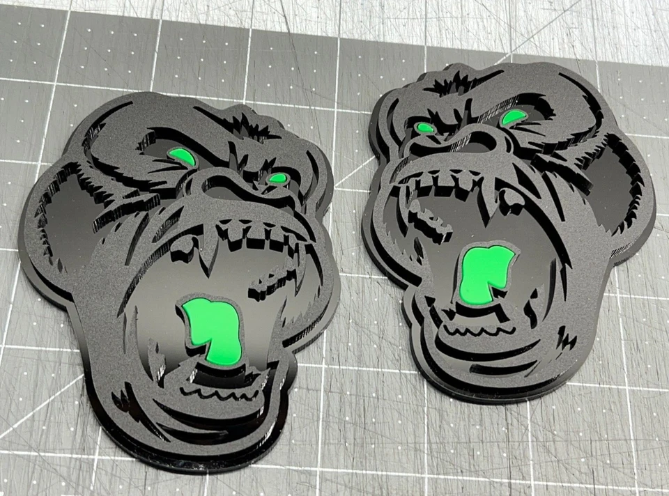 Insignia emblema coche camión ojo verde gorila enojado negro mate/negro paquete personalizado de 2 Foto 2 de 4