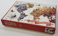  E Wendy Gold Butterfly Migration 1000 Piece Puzzle by Galison