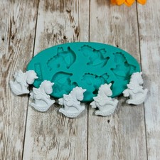 Stampo silicone Cavallo a dondolo 5pz 3cm per gesso, cera, sapone, resina, fimo