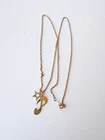 vintage costume jewelry, avon gold tone stars and letters pendant necklace 23 in