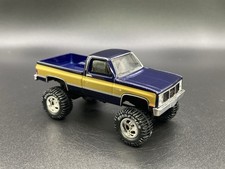 1987 GMC Sierra K1500 Lifted 4x4 Truck 1/64 Diecast Custom Pickup Greenlight K10