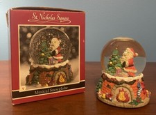 St. Nicholas Square Santa Decorating Tree Musical Snow Globe