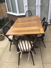 Ercol Vintage Dining Table and 6 matching chairs  (including 6 Plumbs seat pads)