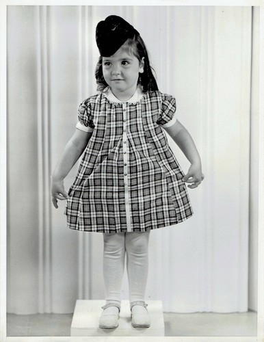 1937 Press Photo Quintuplet Yvonne Dionne in Scotch Plaid Dress & Glengarry Cap - Picture 1 of 2