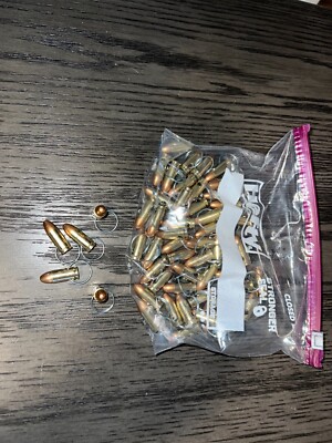 9mm  bullet keychains   lot 0f 50