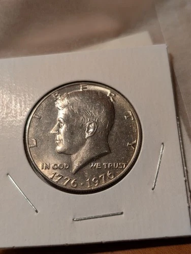 1976 Philadelphia Kennedy Half Dollar About Unc